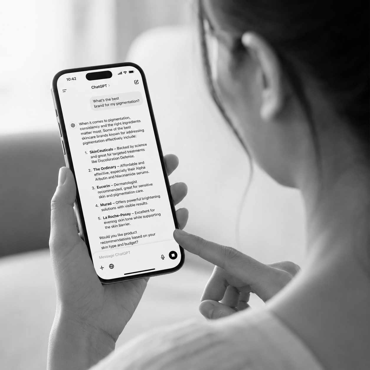 woman on phone searching up skincare recomendations
