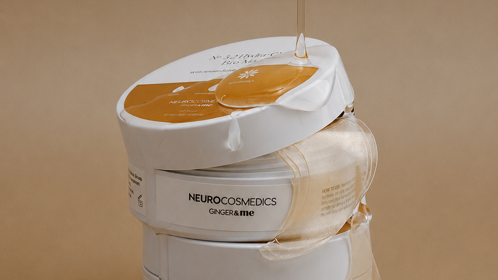 Hydra glow eye mask on skincare packaging with golden serum dripping from top