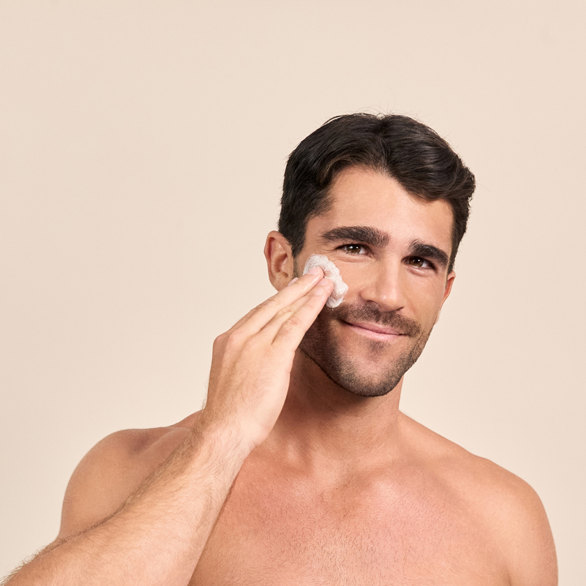 Man applying Dp Deramceuticals CLR Foam Cleanser on face