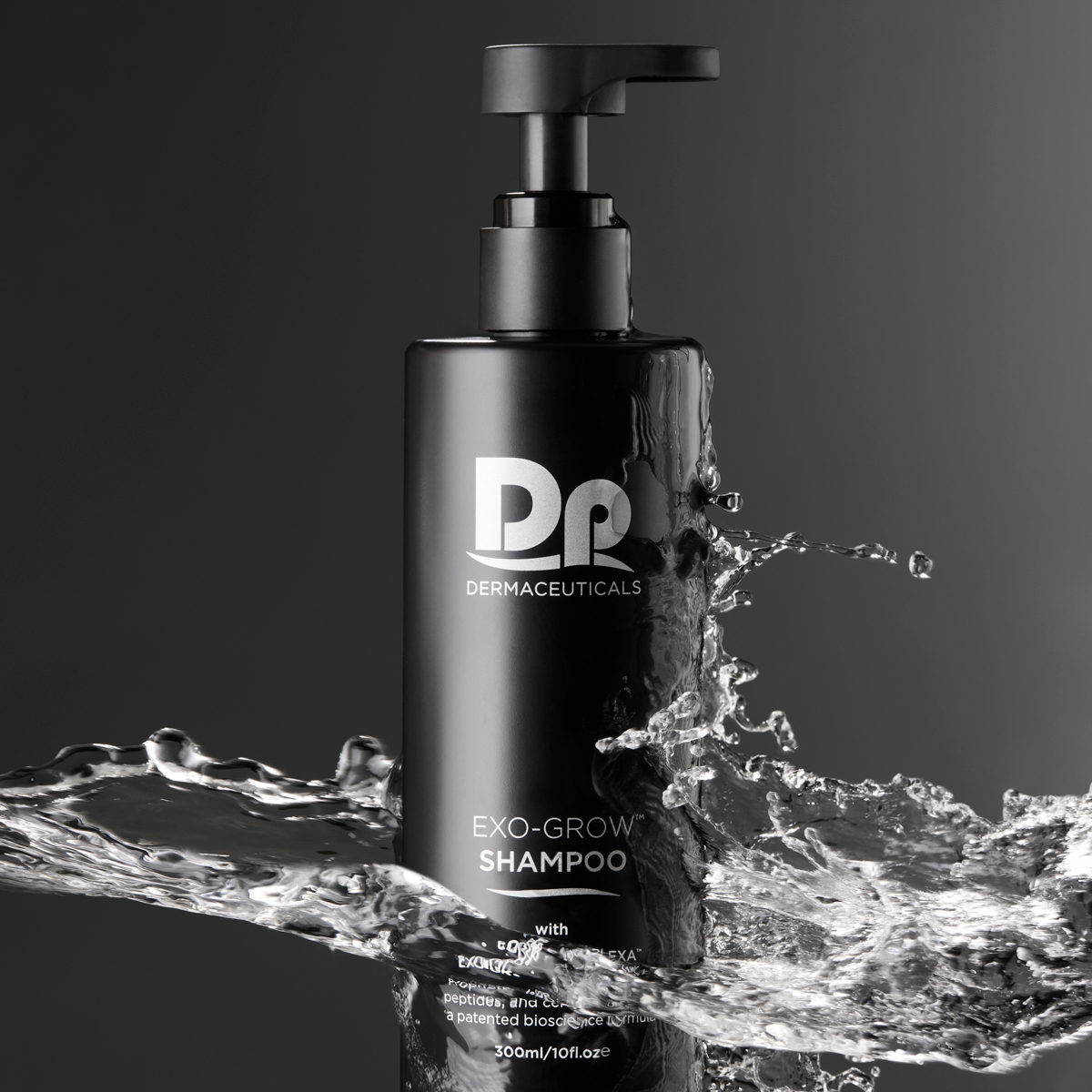 Dp Dermaceuticals Exo-Grow Shampoo bottle with water splashing on it