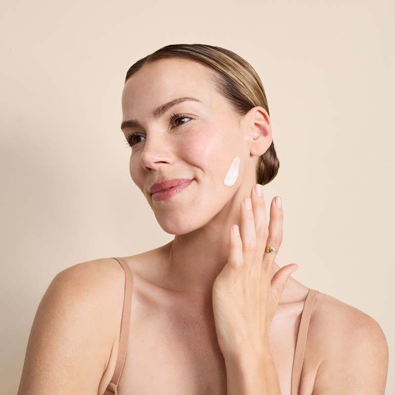 Lady with Dp Dermaceuticals Exo-Skin Moisturiser on face