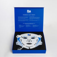 Dp Deramceuticals L.E.D.+ Face Mask in product packaging with lid open
