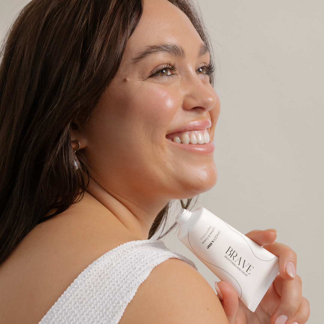 Person holding hand cream