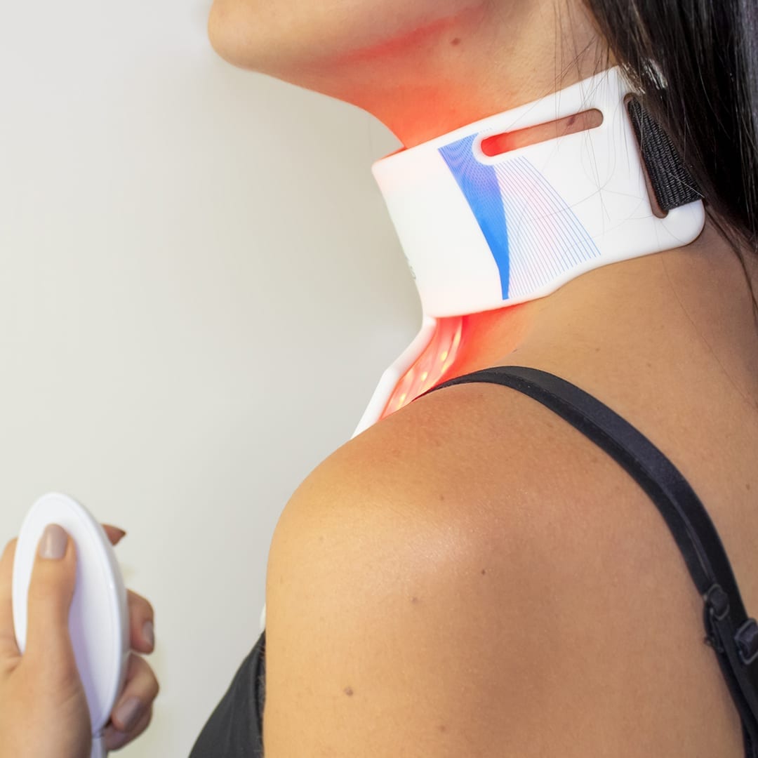 brunette woman led mask neck