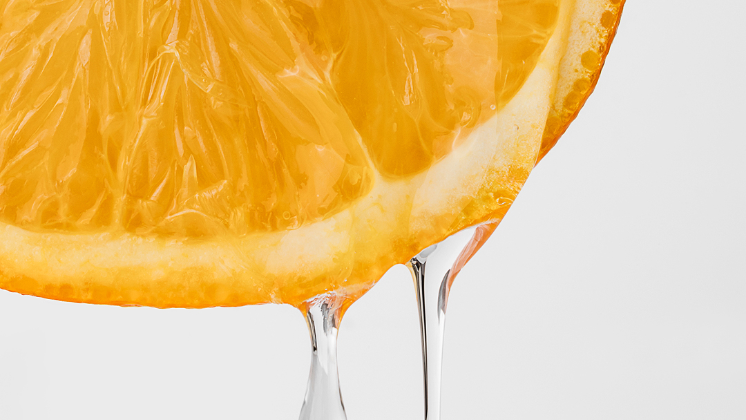 Orange with serum dripping from it