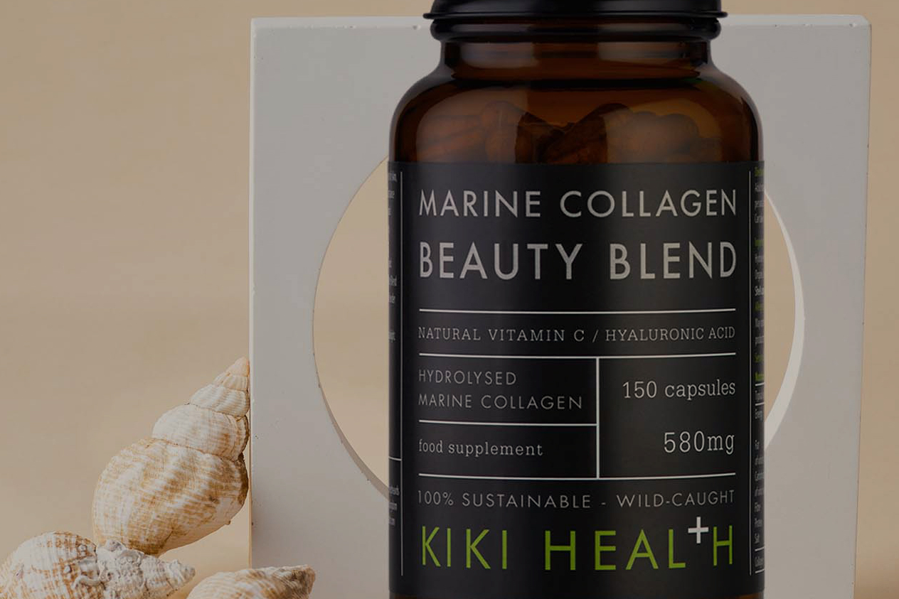 KIKI Health Marine Collagen Beauty Blend product in front of beige background with shells