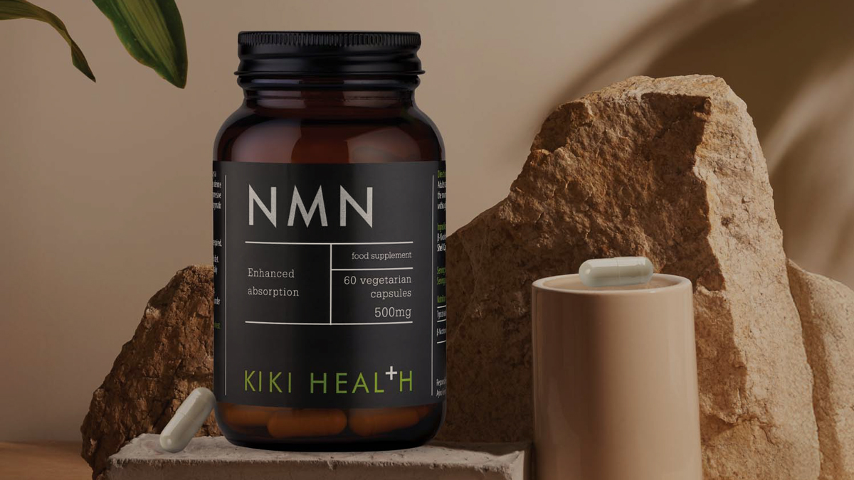 KIKI Health NMN product sitting in front of a beige background with capsules