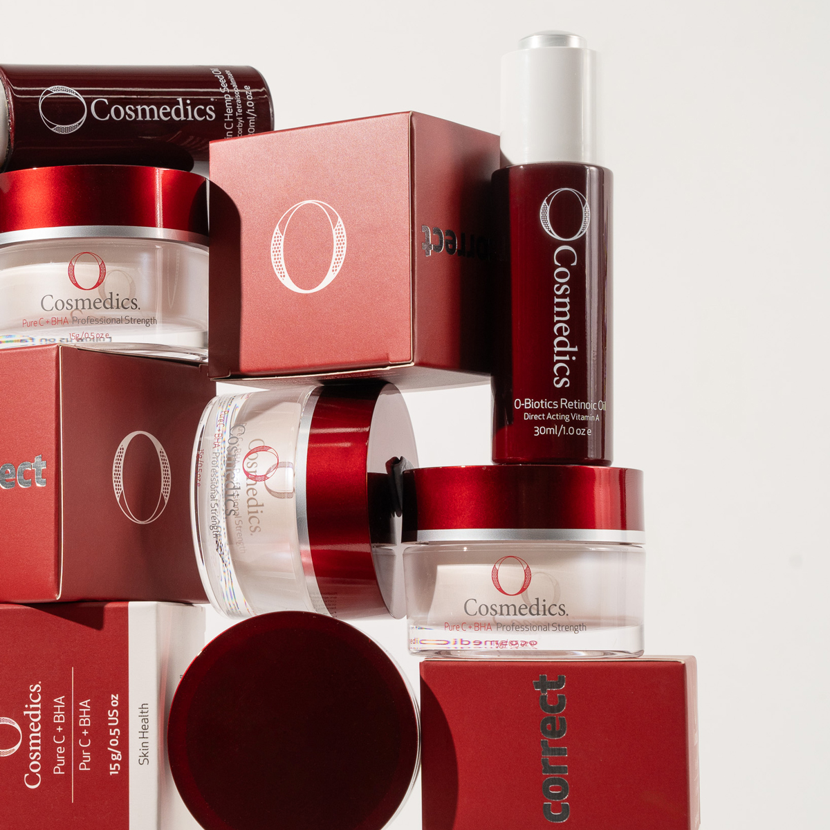 Range of O COSMEDICS products stacked on top of each other