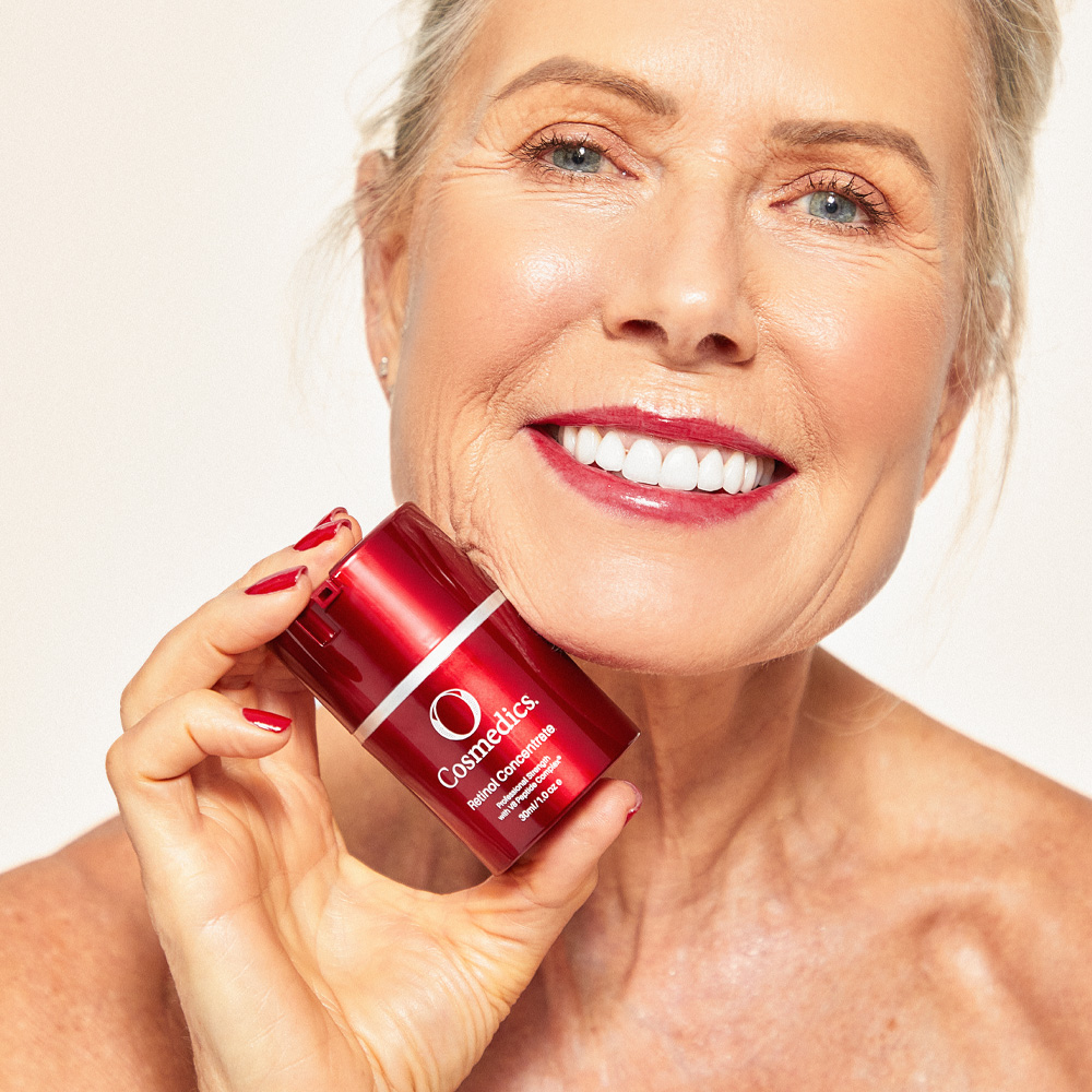 Lady holding O COSMEDICS Retinol Concentrate