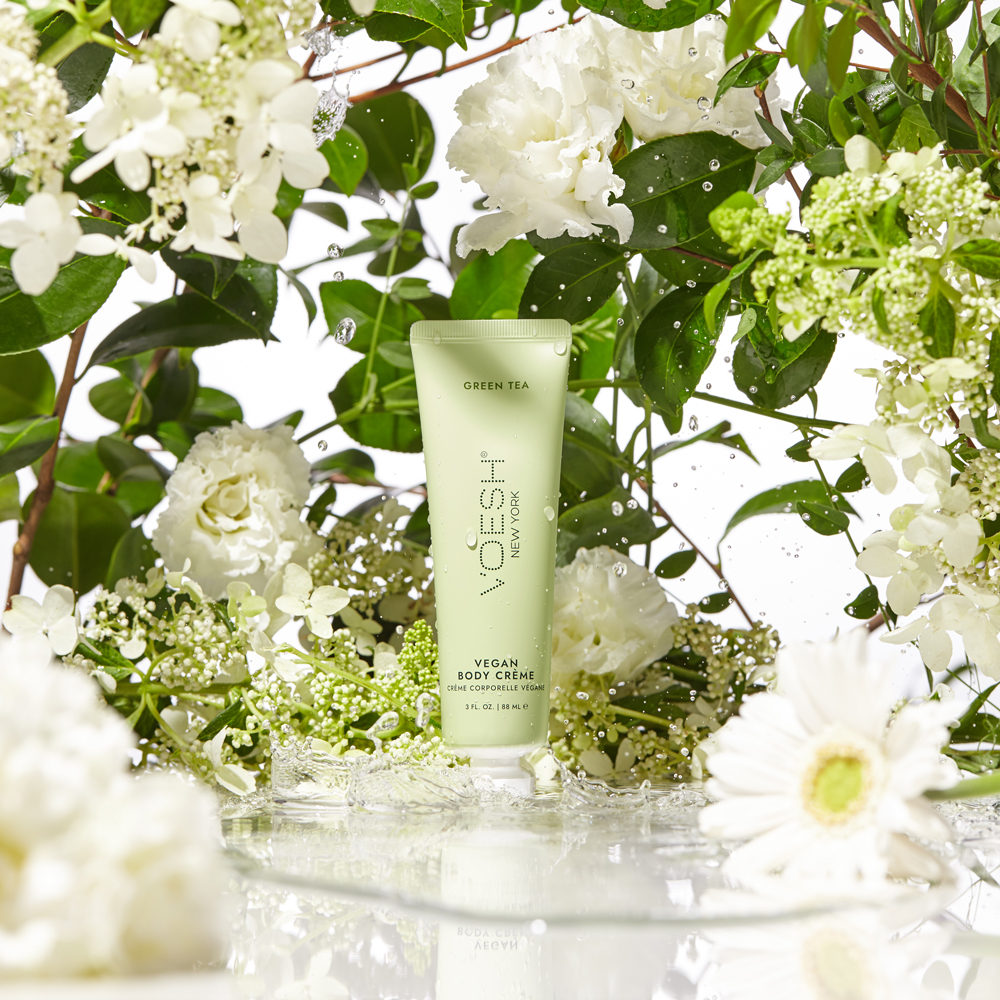 VOESH Vegan Body Creme Green Tea in front of floral display