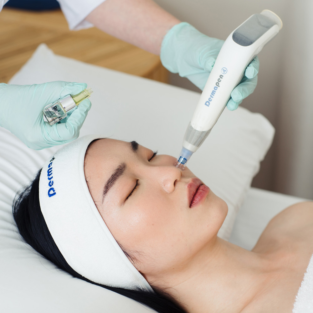 Person receiving a Dermapen treatment in a salon