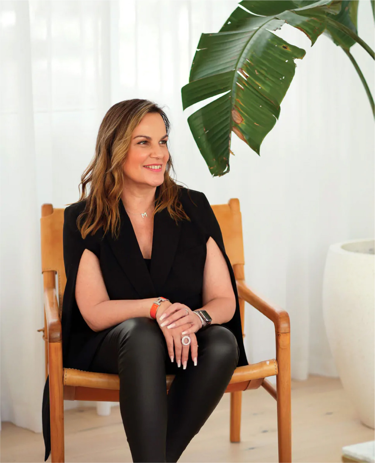 maria enna cocciolone, portrait of woman sitting and smiling off to the right